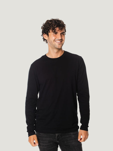 Navid is 6'1, 165 lbs and wears size M # Black Long Sleeve Crew Neck T-Shirt | Fresh Clean Threads UK